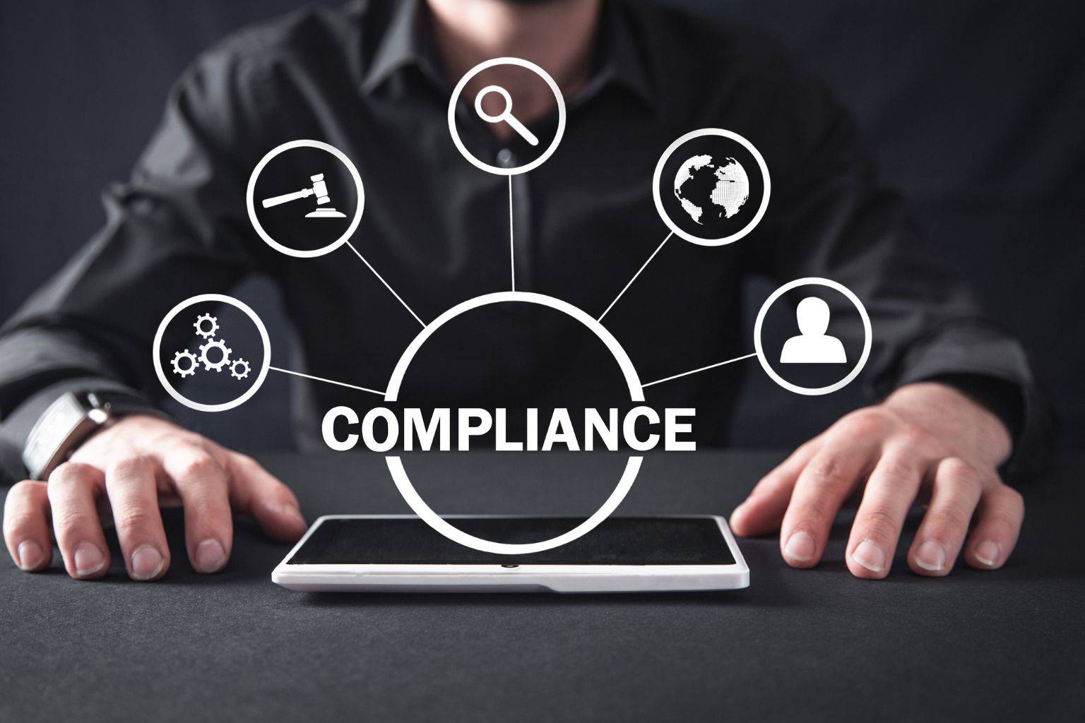 Hands on a tablet with a bold COMPLIANCE graphic and icons for gears, gavel, globe, magnifier, and user.
